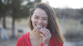 Photo of smiling brunette girl