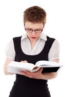 Woman with glasses reading a book at white background