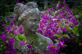 statue with flowers