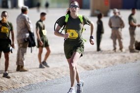 woman runs in competitions