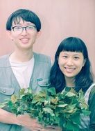 asian couple lovers with green plants