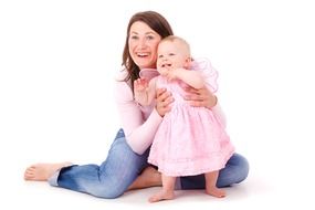 portrait of mother with baby doughter