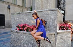 happy young girl in flowers