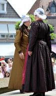 women in traditional ethnic costumes of holland