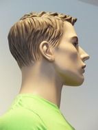 male mannequin in green t-shirt