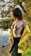 topless woman at autumn lake, czech