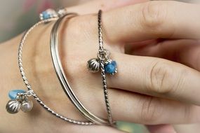 closeup photo of the jewelry on a hand