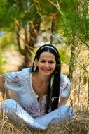 Brunette woman in the forest