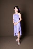 young asian woman in purple dress