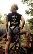 girl with tattoos on her legs