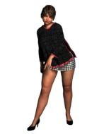 woman standing in a short skirt
