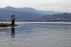 couple in fishing process