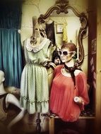 mannequins in a retro fashion store