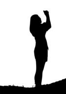 black profile of a girl with a camera