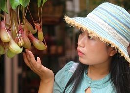 portrait of young asian woman small fresh fruit