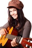 girl in a cap with a guitar