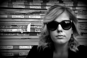 Black and white photo of the woman with sunglasses