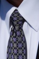 tie with a white shirt
