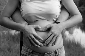 pregnant belly hands