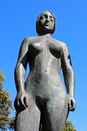 bronze sculpture of a woman