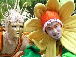 people in colorful costumes at the festival