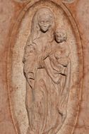 carved sculpture of mother of god