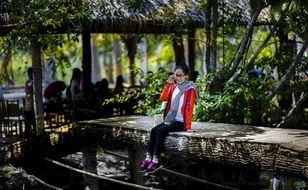 stylish young woman talking on phone