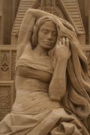 sand sculpture woman