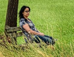 woman sitting on a bench