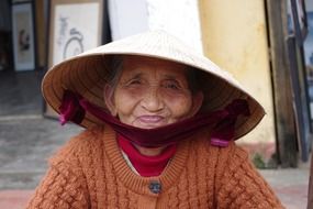 aged woman in hat