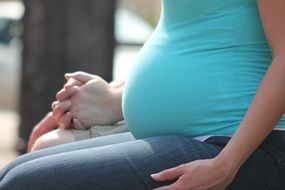 pregnant woman on the bench