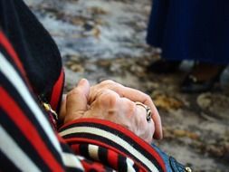 hand of an old woman with a ring