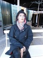 handsome female mannequin on bench