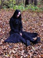 female model wearing black forest scene