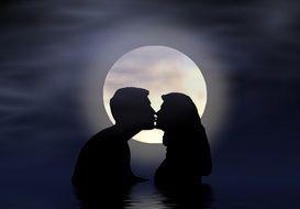 kiss of a couple in love on the background of the moon