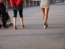 female legs in shoes with heels