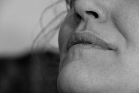 Black and white photo of the lips and nose