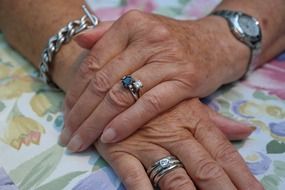 aged woman hands jewellery finger