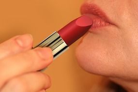 applying of a lipstick