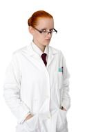 red-haired girl in a white coat