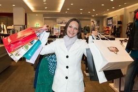 happy woman with shopping bags