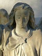 female face of religious sculpture