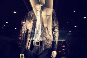 dressed mannequin on a shop window