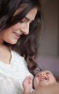 Happy mother in motherhood time