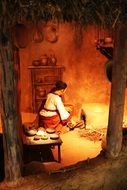 Photo of woman doll in a kitchen