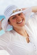 portrait of a happy woman in white