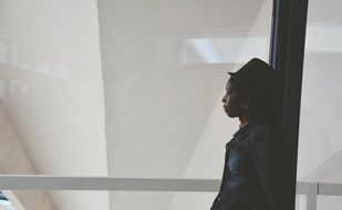 African woman near the window