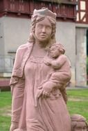 stone figure woman and children