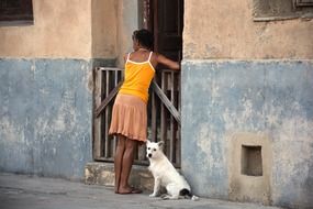 woman with white dog cuba