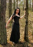 gothic brunette in the forest